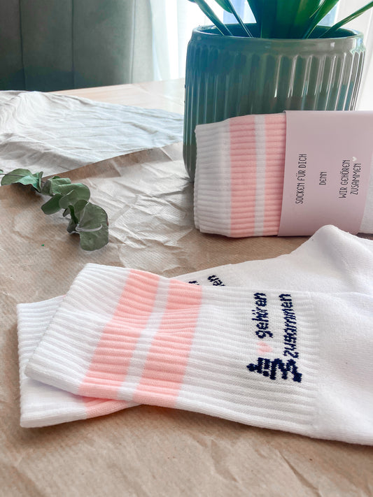 „Wir gehören zusammen“-Socken – ein Paar, das verbindet