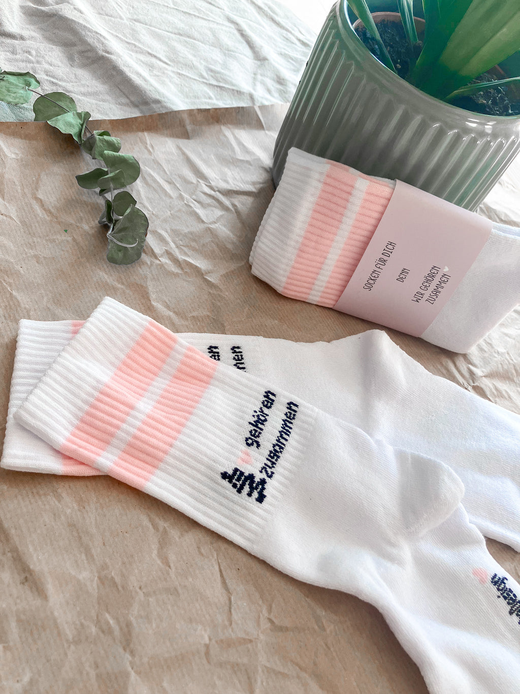„Wir gehören zusammen“-Socken – ein Paar, das verbindet